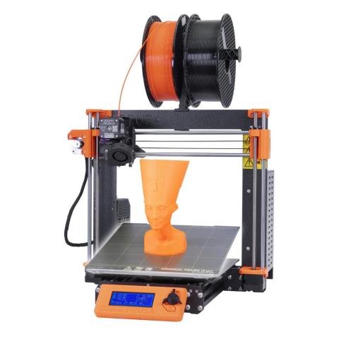 a prusa 3d printer with an egyptian figure bust on the print plate