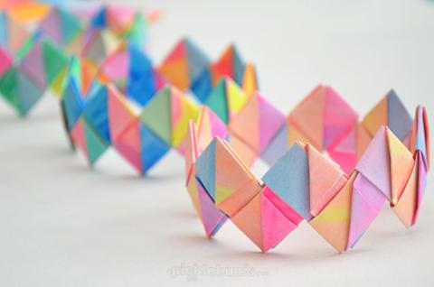 Bracelets made from folded paper.