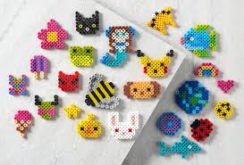 A collection of animals made from perler beads.