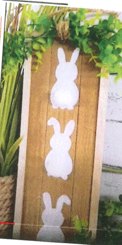 Little bunnies on wood frame.